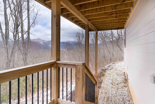 wooden terrace featuring a mountain view