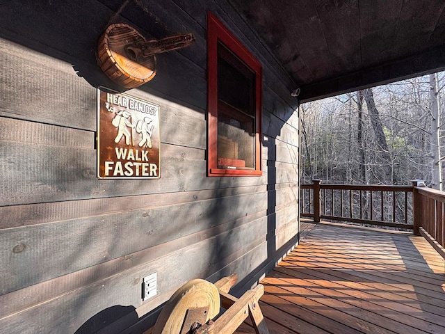 wooden deck featuring a porch