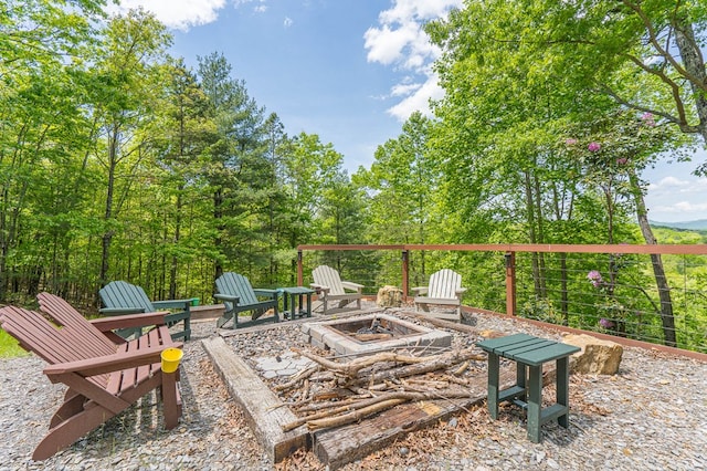 view of patio with an outdoor fire pit