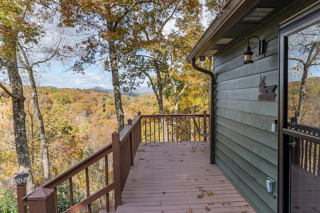 wooden terrace with a mountain view