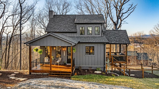 exterior space featuring a mountain view and a porch