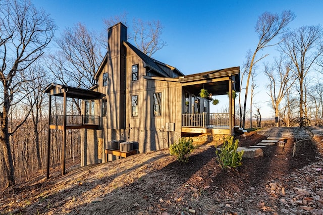 view of home's exterior featuring a chimney