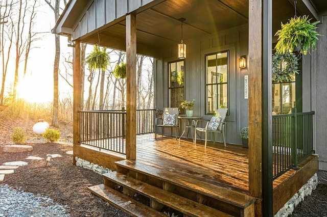 wooden terrace with a porch