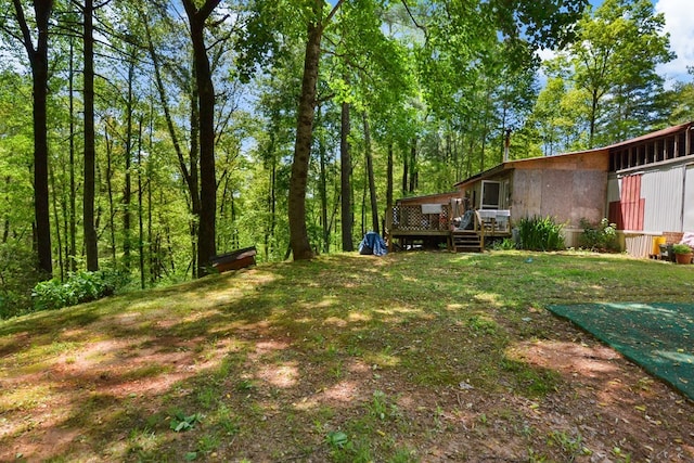 view of yard featuring a deck