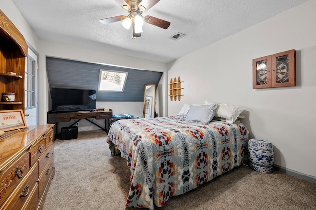 bedroom with a ceiling fan, baseboards, visible vents, carpet floors, and a textured ceiling