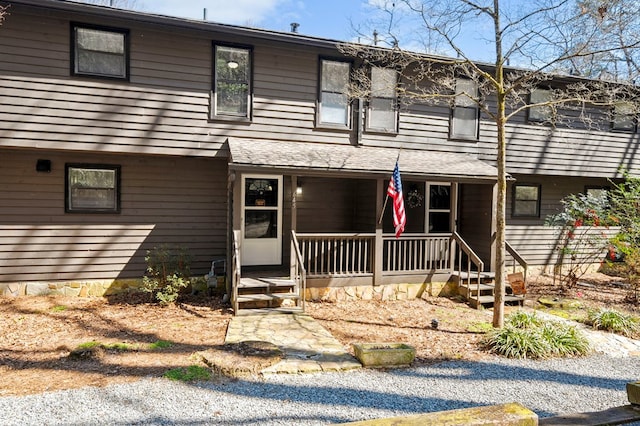 multi unit property featuring a porch