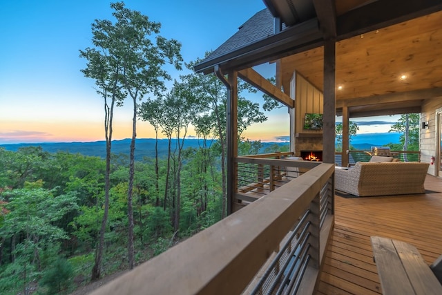 exterior space with a water view and outdoor lounge area