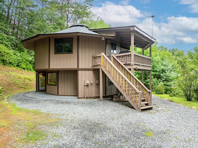 exterior space featuring a wooden deck