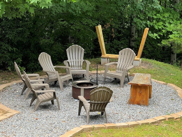 view of patio / terrace with an outdoor fire pit