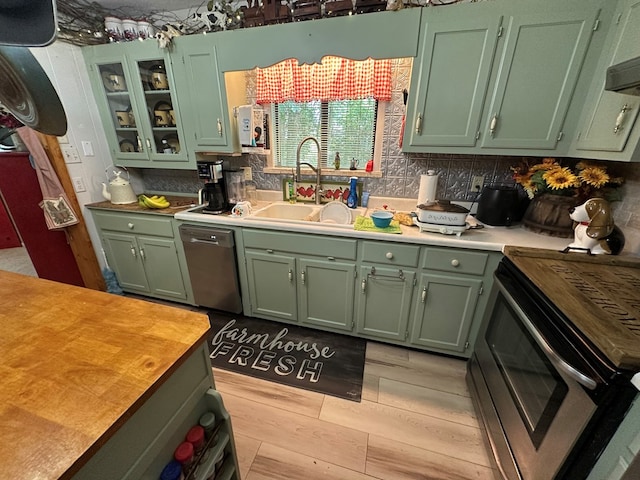 10 Whippoorwill Ln, Murphy, NC 28906 - kitchen featuring green cabinets, stainless steel appliances, and a sink