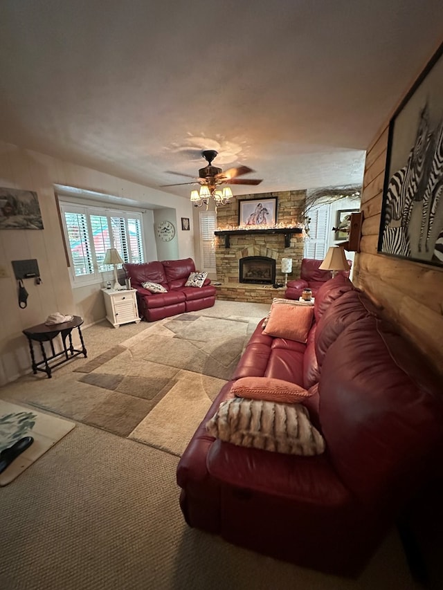 10 Whippoorwill Ln, Murphy, NC 28906 - living area with carpet, a ceiling fan, and a stone fireplace