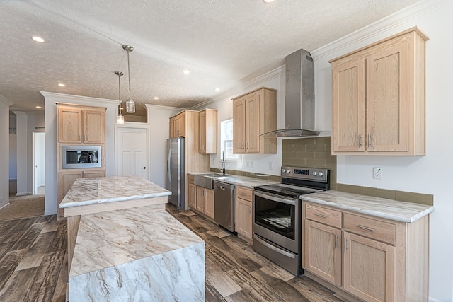 kitchen with appliances with stainless steel finishes, dark hardwood / wood-style floors, light brown cabinets, a center island, and wall chimney range hood