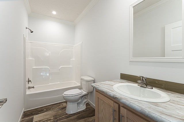 full bathroom with shower / bathtub combination, wood-type flooring, toilet, crown molding, and a textured ceiling