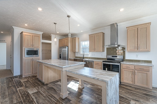 kitchen with appliances with stainless steel finishes, decorative light fixtures, a center island, dark wood-type flooring, and wall chimney range hood