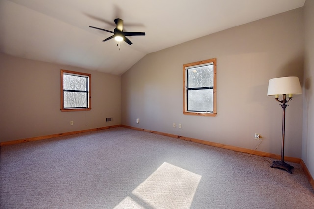 bonus room featuring ceiling fan, lofted ceiling, carpet, and a wealth of natural light