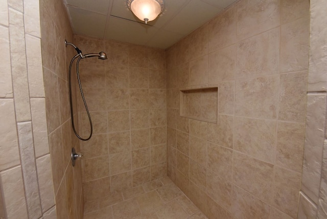 bathroom with tiled shower