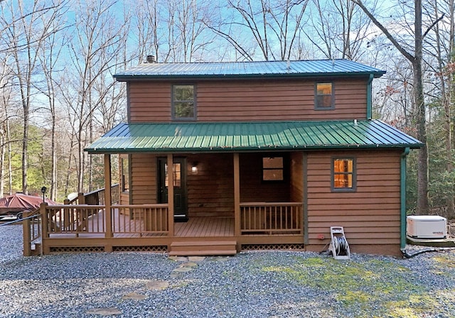 view of front of house with a wooden deck