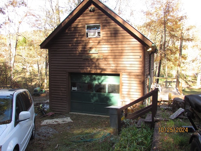 view of home's exterior with a garage