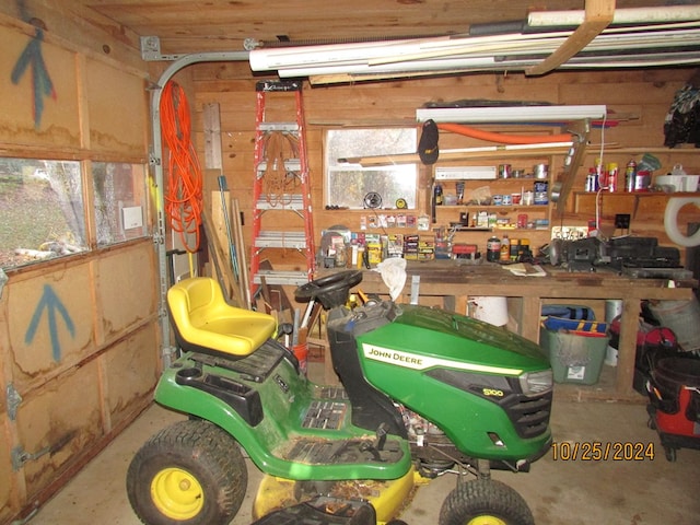 garage with a workshop area