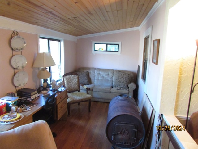 living room featuring hardwood / wood-style floors, crown molding, wood ceiling, and a healthy amount of sunlight