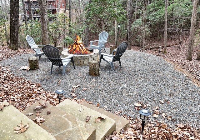 view of patio / terrace featuring a fire pit