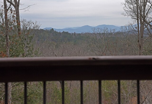 mountain view featuring a view of trees