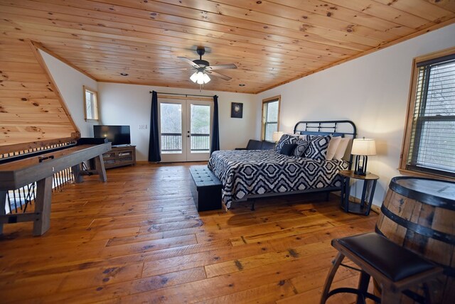 bedroom with hardwood / wood-style flooring, wood ceiling, access to outside, french doors, and ornamental molding