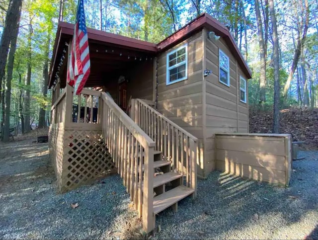 exterior space featuring a wooden deck