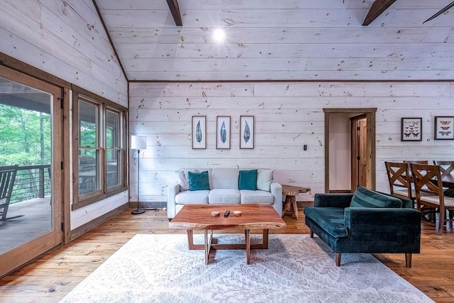 1085 Dills Rd, Blue Ridge, GA 30513 - living room featuring wooden walls, light wood-style flooring, and lofted ceiling