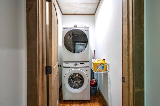 1085 Dills Rd, Blue Ridge, GA 30513 - laundry area with stacked washer / drying machine, ornamental molding, and wood finished floors