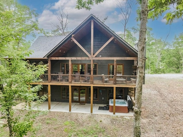 1085 Dills Rd, Blue Ridge, GA 30513 - rear view of property with a hot tub, a patio area, french doors, and a wooden deck