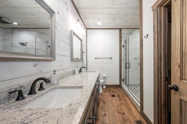 1085 Dills Rd, Blue Ridge, GA 30513 - bathroom with hardwood / wood-style floors, wooden ceiling, a stall shower, baseboards, and double vanity
