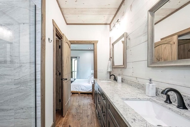 1085 Dills Rd, Blue Ridge, GA 30513 - bathroom with hardwood / wood-style floors, double vanity, and connected bathroom