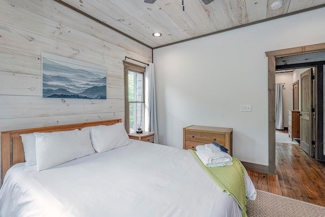 1085 Dills Rd, Blue Ridge, GA 30513 - bedroom with wood finished floors, wood walls, recessed lighting, wood ceiling, and baseboards