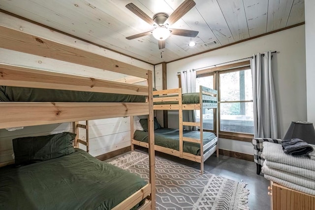 1085 Dills Rd, Blue Ridge, GA 30513 - bedroom with finished concrete floors, wooden ceiling, and baseboards