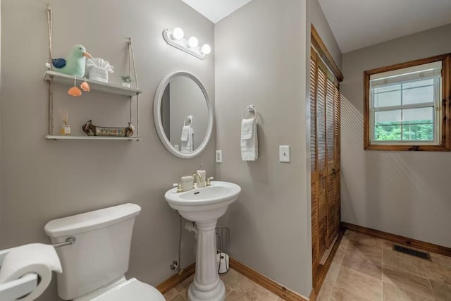 bathroom with sink and toilet