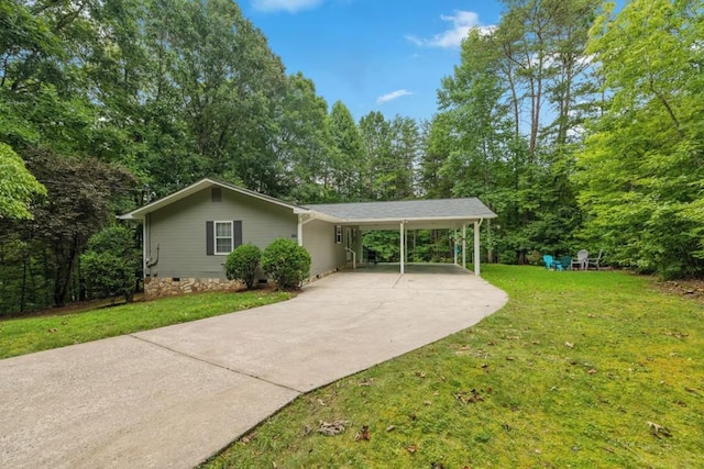 exterior space featuring a front lawn and a carport