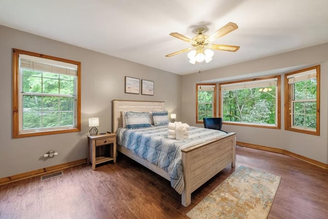 bedroom featuring dark wood-type flooring and ceiling fan