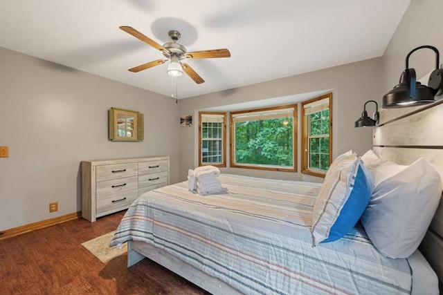 bedroom featuring ceiling fan and wood-type flooring