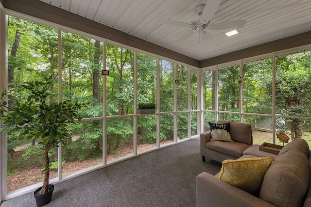 sunroom featuring plenty of natural light and ceiling fan