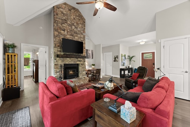457 Celie Ann Seabolt Rd, Cleveland, GA 30528 - living room with high vaulted ceiling, a ceiling fan, wood finished floors, baseboards, and a stone fireplace