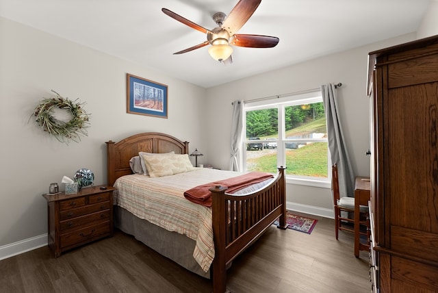 457 Celie Ann Seabolt Rd, Cleveland, GA 30528 - bedroom featuring baseboards, dark wood-style floors, and ceiling fan