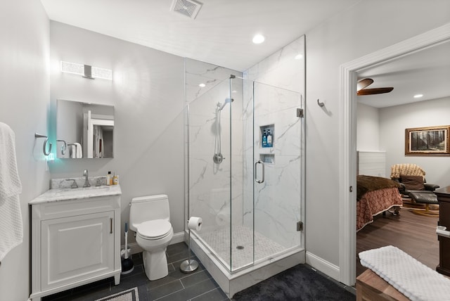 457 Celie Ann Seabolt Rd, Cleveland, GA 30528 - ensuite bathroom with baseboards, a marble finish shower, vanity, recessed lighting, and toilet