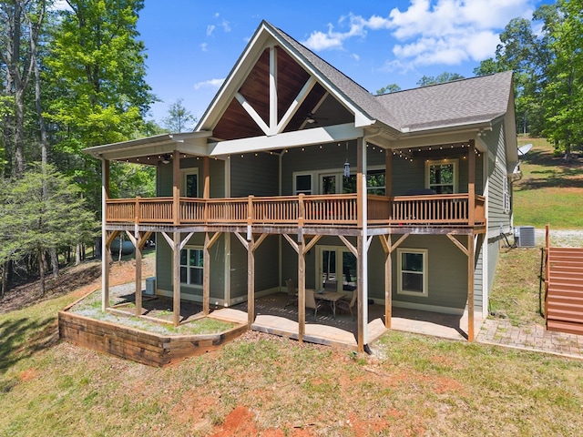 457 Celie Ann Seabolt Rd, Cleveland, GA 30528 - back of property with central AC, a deck, a yard, and a patio