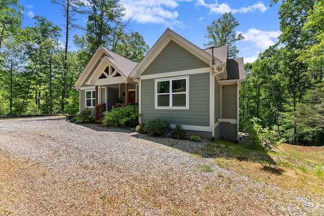 457 Celie Ann Seabolt Rd, Cleveland, GA 30528 - view of front of property with covered porch, roof with shingles, and gravel driveway