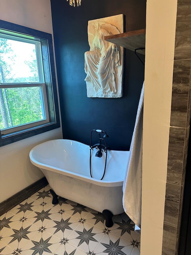 full bathroom featuring a freestanding bath