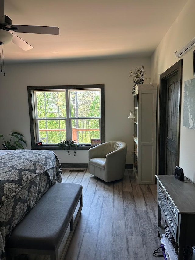 bedroom featuring ceiling fan and wood finished floors
