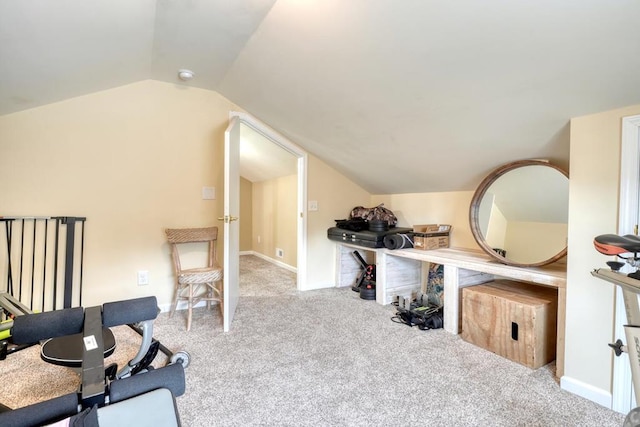 sitting room featuring vaulted ceiling, carpet floors, and baseboards