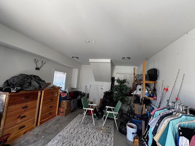 interior space with unfinished concrete flooring