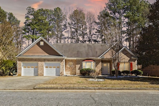 3065 NW Kings Rd, Kennesaw, GA 30144 - single story home with an attached garage, concrete driveway, and brick siding